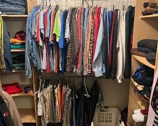 Lots of name brand me s clothes 