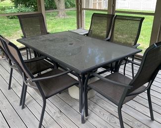 Patio Table & Chairs always stored under a roof