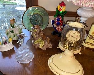 Home decor items including a few of the clock collection items and Murano(?) clown