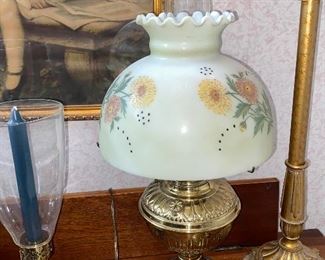 Electrified brass lamp with floral shade