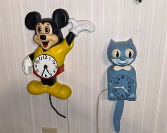 Mickey Mouse wall clock and blue  cat clock 
