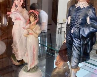 Little boy blue and lady figures 