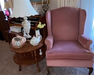 1of 2 two tier  round end tables and 1 of 2 high back armchairs 