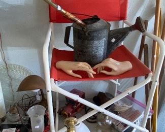 Watering can and random severed hands 