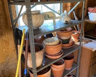 Metal shelf full of pots for your spring planting 