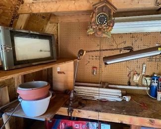 Shed work bench and lots of terra cotta pots