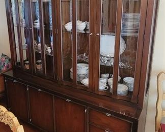 awesome mid-century concave glass china cabinet