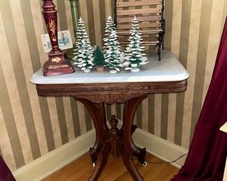 Victorian walnut marble topped table on wheels