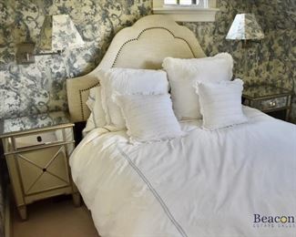 Queen bed with upholstered headboard