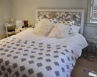 Queen bed with upholstered headboard
