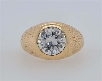 Very good condition. From Calhoun's: "One men's 14kt yellow gold "Gypsy" style ring mounting containing one round brilliant-cut diamond measuring 9.5x5.5mm and weighing approximately 3.50 cts with a color of G and clarity of VVS2. Finger size: 10. Metal weight 9.18 DWTs." Appraised in 2007 for $126,350.00 by a local jeweler, copy included with purchase. From appraisal: "One gents yellow gold ring, not karat or trademarked, estimated to be 14K. Gents ring is flush set with one AGS provisional grade 4/1/1/1/3.50 carats round brilliant cut diamond."
