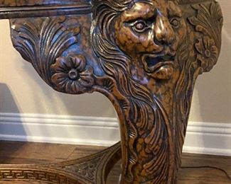 Ornate lion face table