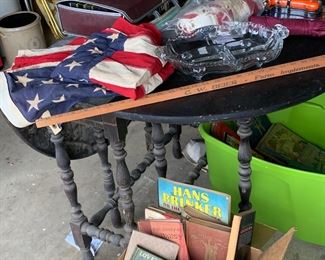 Antique gate leg table, vintage flags, antique books