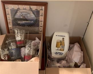 Beer signs and boxes of wrapped items to dig through!