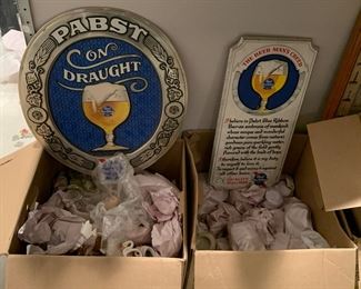 Beer signs and more boxes of wrapped items to dig through!