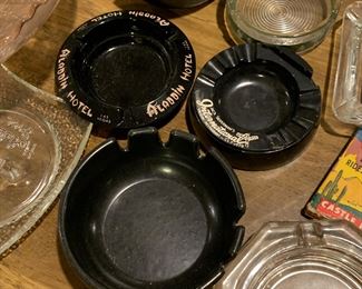 Vintage ashtrays from local areas, and from Vegas
