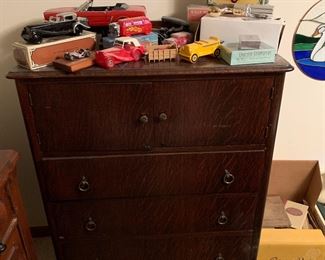 Antique dresser, Avon cars, model cars