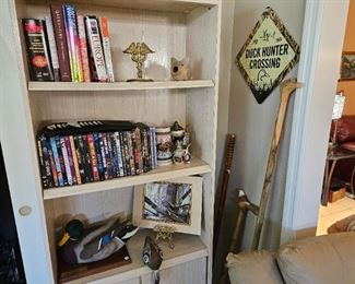 Notice the carved alligator cane