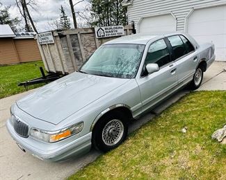 1995 Mercury Grand Marquis (8 Cylinders W 4.6L FI SOHC 281 CID), 150,000 miles. Clean title. This item is available for pre-sale purchase.