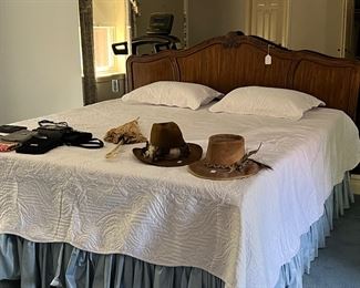 Nice king size bed with headboard and bedding