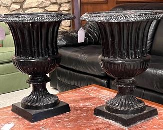 Pair of large black metal urns