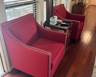 Pair of modern red chairs, table and lamp 