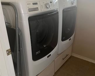 Maytag front loader washer and dryer with stands, stained glass and step stool
