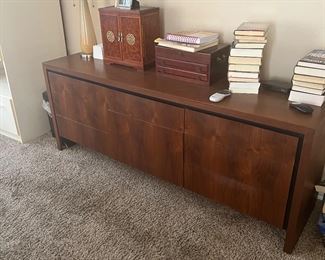 Mid Century Modern dresser and lots of books. Large SONY TV