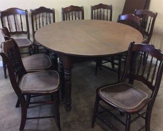 ANTIQUE TABLE & LEATHER SEATED