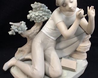 LLADRO ‘’STUDENT FLUTE PLAYER’’ FIGURINE