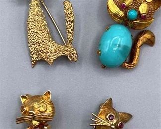 Collection Of Gold Cat Brooches