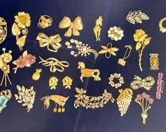 Gold Brooches