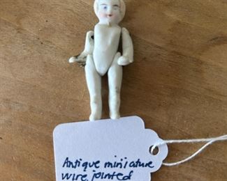 Antique miniature wire jointed 2" 