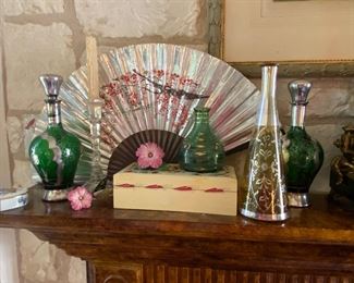 Silver overlay glass decanters and other pieces.