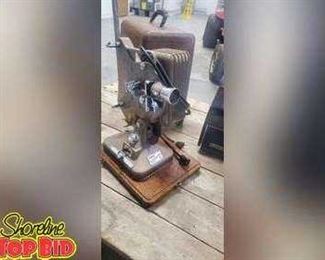 Panasonic camcorder. Bell and Howell Slide Projector. Keystone 16 mm Projector