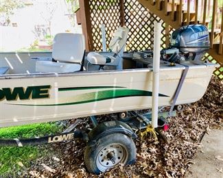 2002 14 ft. Lowe Sea Nymph V with Yamaha 4 Stroke, 25HP outboard, 3 seats, trolling motor, trailer, with titles. 