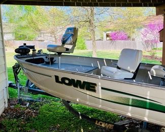 2002 14 ft. Lowe Sea Nymph V with Yamaha 4 Stroke, 25HP outboard, 3 seats, trolling motor, trailer, with titles. 