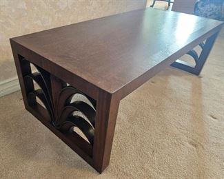 10.  $150.00. Magazine/cocktail table.  Carved panel sides.  16" x 48" x 22" 