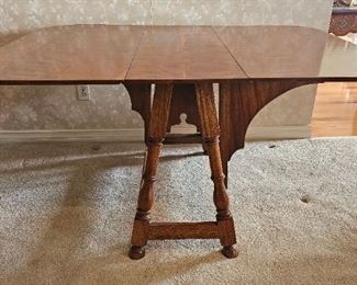 23.  $100.00.  Tavern table w/bat wing support drop leaf.  29" x 55.5" leaves up x15.5 leaves x 43" 
