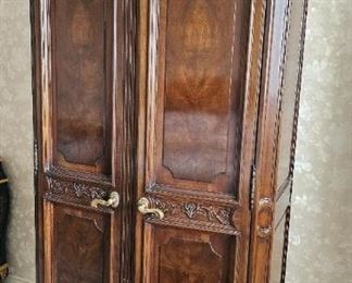 25.  $200.00 Gents cabinet burl walnut veneer. 79" x 43" x 19" 