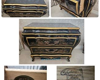 27 400.00.  Pair.  Chinoiserie style black lacquered Bombe side chests. 26" x 33" x 17".   Note:  there are two but only one is pictured. Both are lovely.