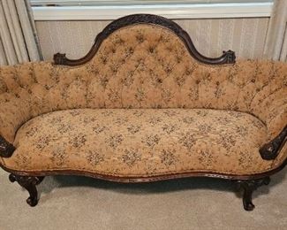 29.  $250.00. Rococo style  Victorian sofa exposing walnut frame.  Wear to fabric and priced accordingly. see add'l pictures 31" x 70" x 31" 