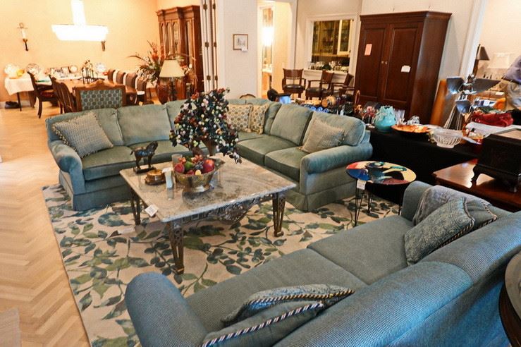 Designer sofas, marble and steel coffee table