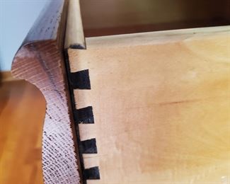 The newer bedroom set is made solid via dovetailing