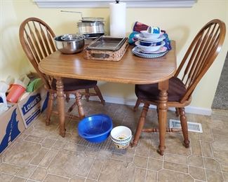 Kitchen table has drop leaves