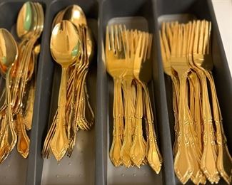 Gold colored eating utensils