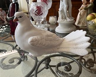 lots of porcelain statues--angels, Shepards, children, girls