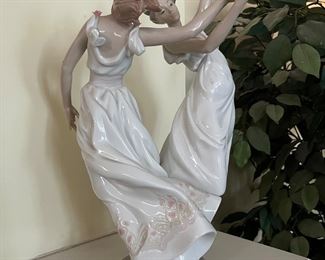 lots of porcelain statues--angels, Shepards, children, girls