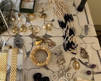 Loads of costume jewelry, an entire room filled--Trifari, Napier, Monet and more.