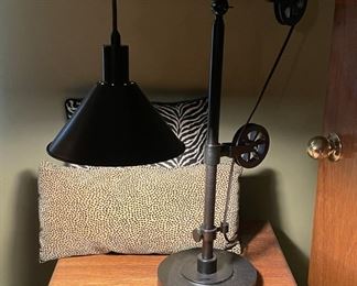 Various home decor including, side tables, floor and table lamps, wall art, throw pillows, clocks, mirrors, and more!